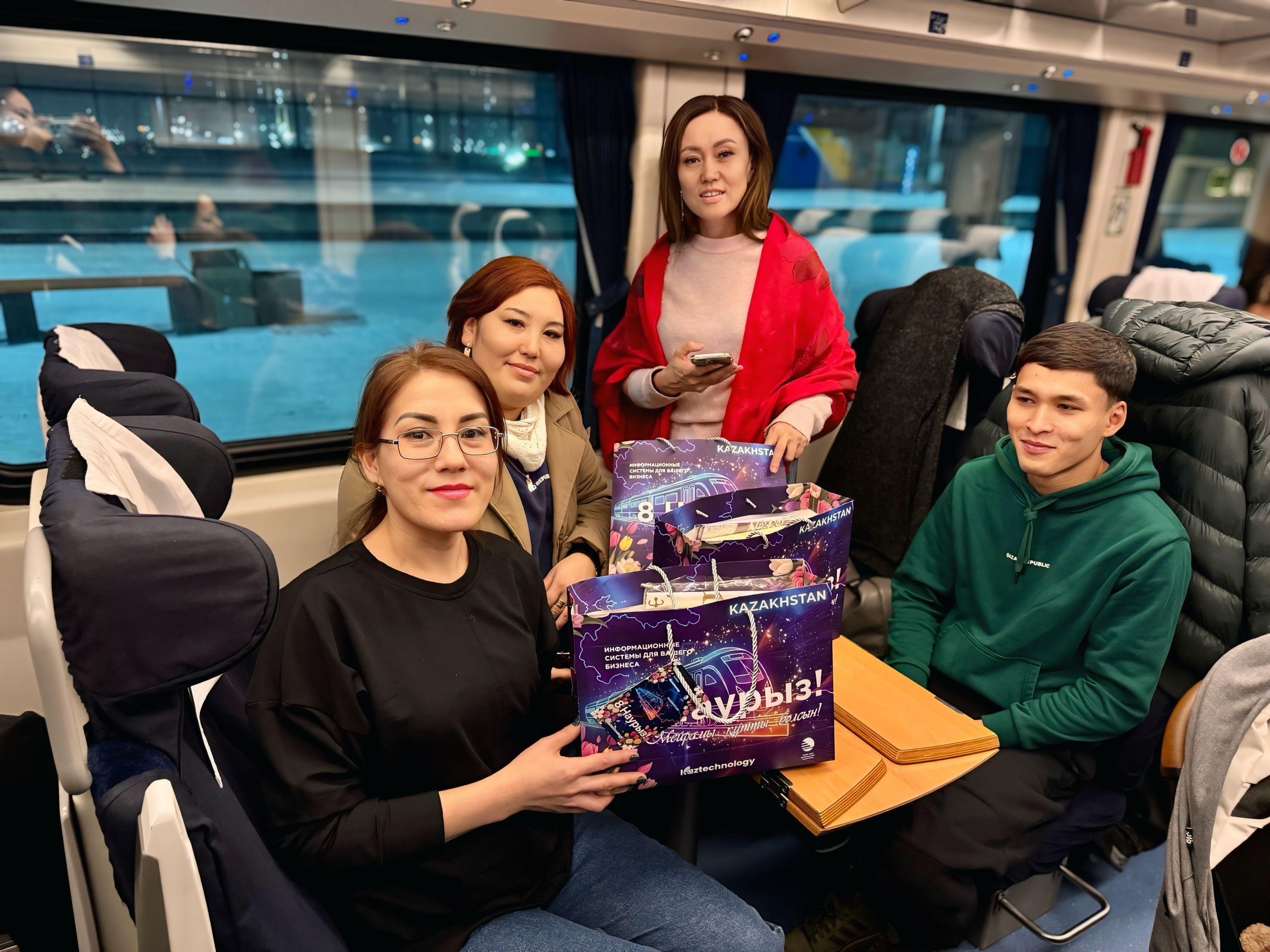 В поездах Национального перевозчика КТЖ и KAZTECHNOLOGY начали поздравлять более тысячи женщин с 8 Марта